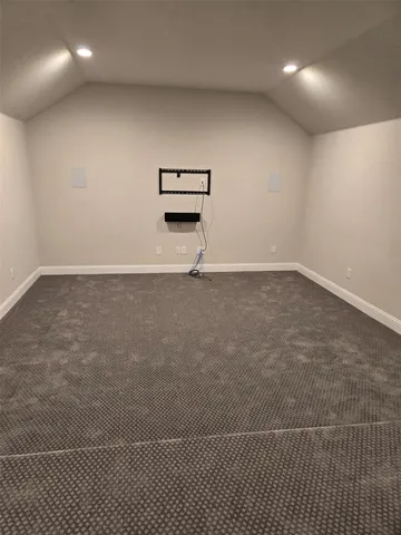 an empty room with a projector
