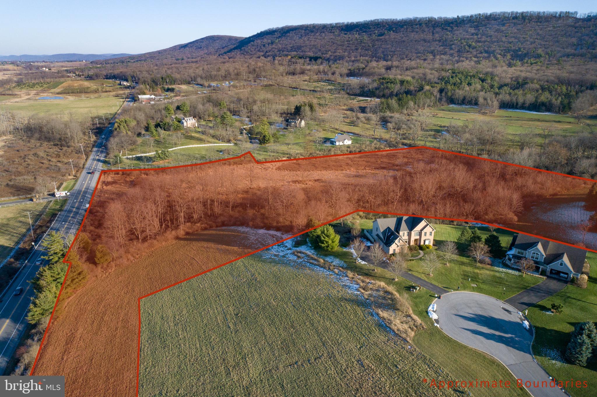 0 Bear Meadows Road Centre Hall, PA 16828 - Photo 4 of 4 an aerial view of a house with a lake view