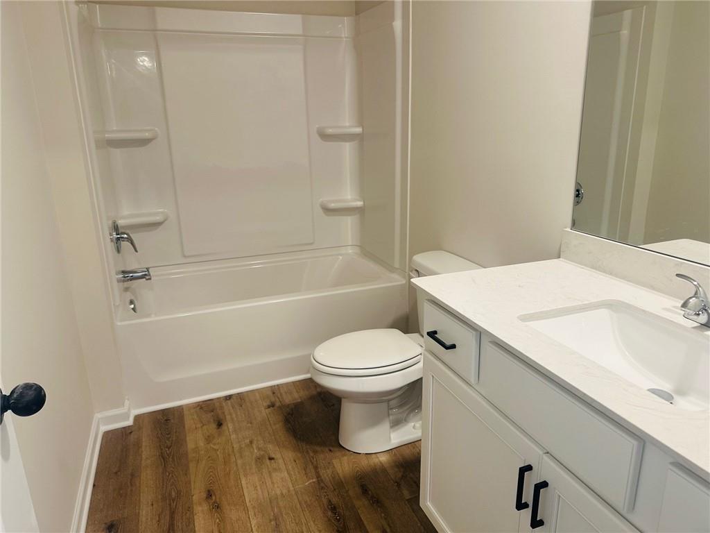 325 Rodeo Drive Auburn, GA 30011 - Photo 23 of 39 a bathroom with a sink toilet and shower