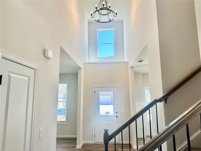 a view of a hallway with entryway