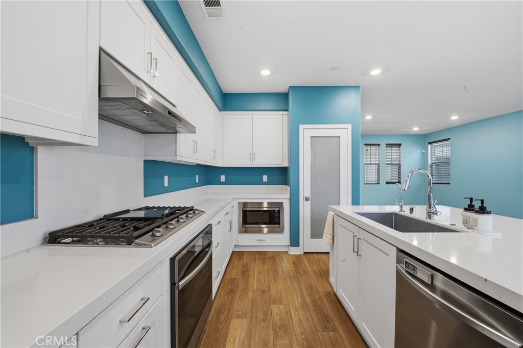 1040 North Anaheim, Unit 1 Anaheim, CA 92801 - Photo 17 of 45 designer-selected cabinetry, high-end stainless steel and smart appliances, and energy-efficient upgrades throughout