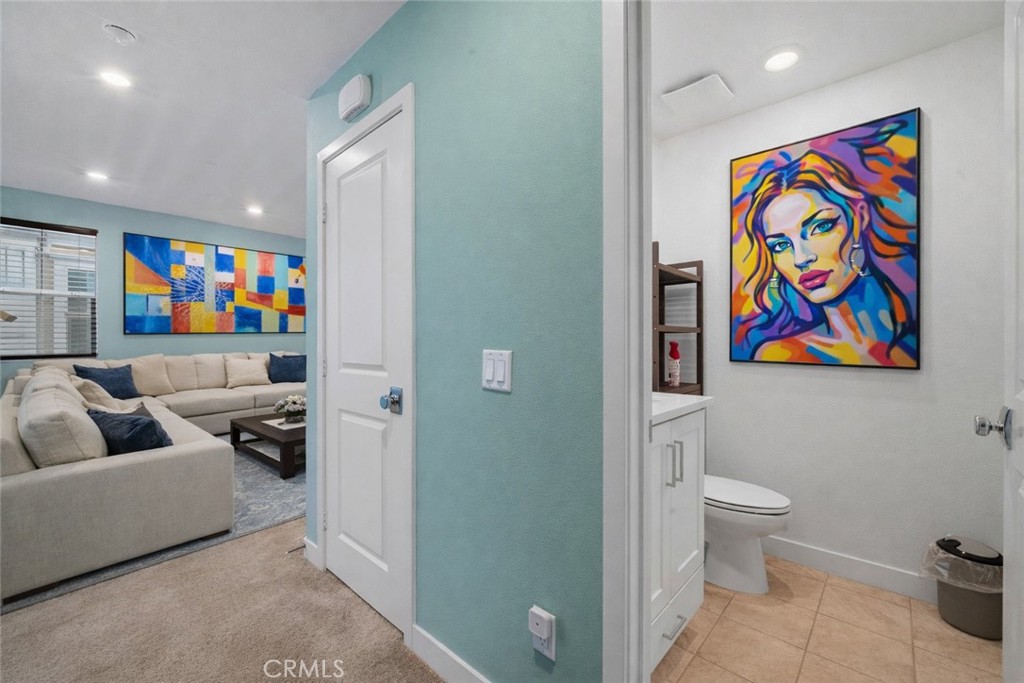 1040 North Anaheim, Unit 1 Anaheim, CA 92801 - Photo 10 of 45 powder room and closet on second floor (Virtually Staged)