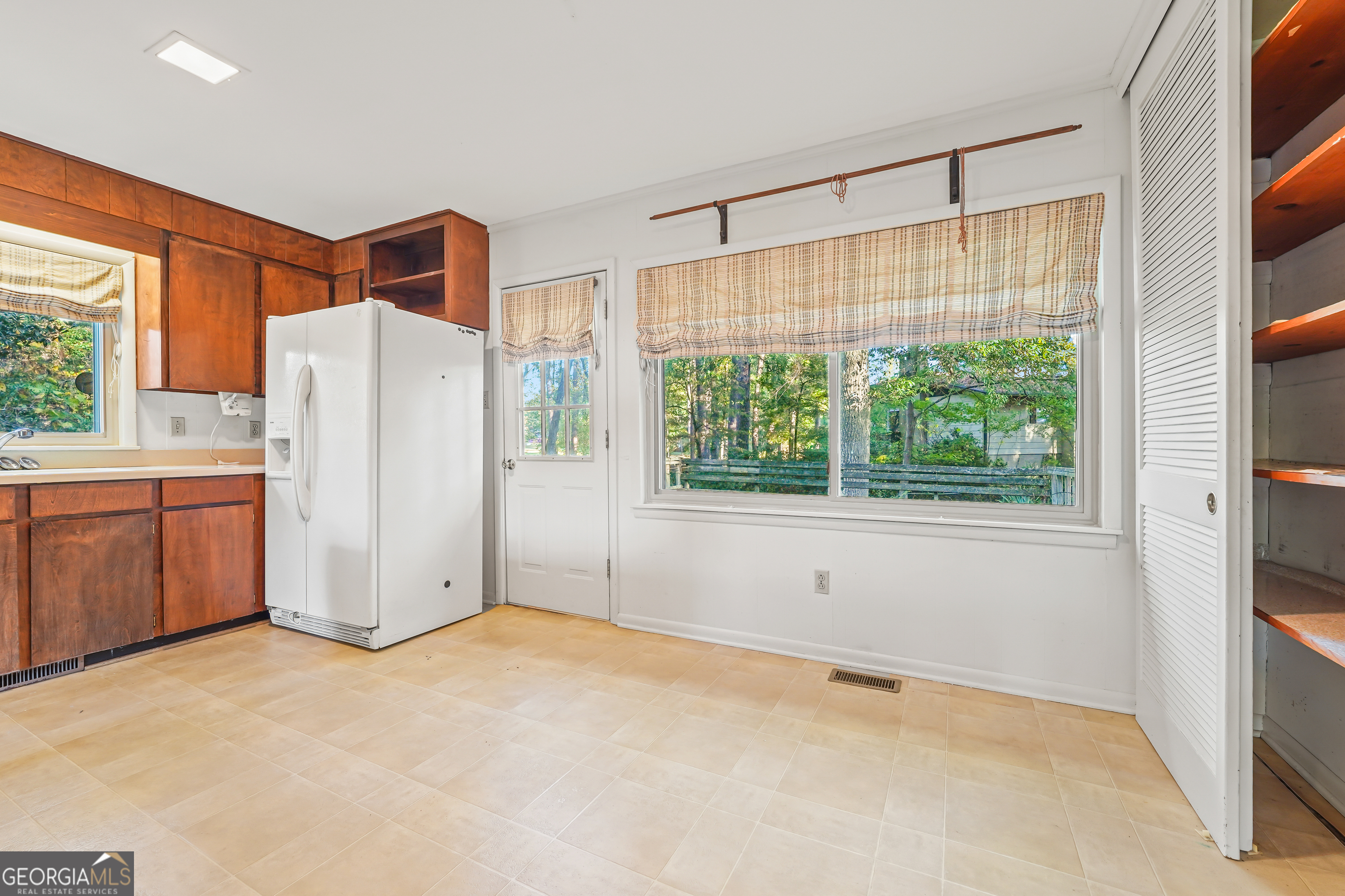 1784 Cedarwood Road Milledgeville, GA 31061 - Photo 11 of 30 a view of a kitchen with a stove top oven