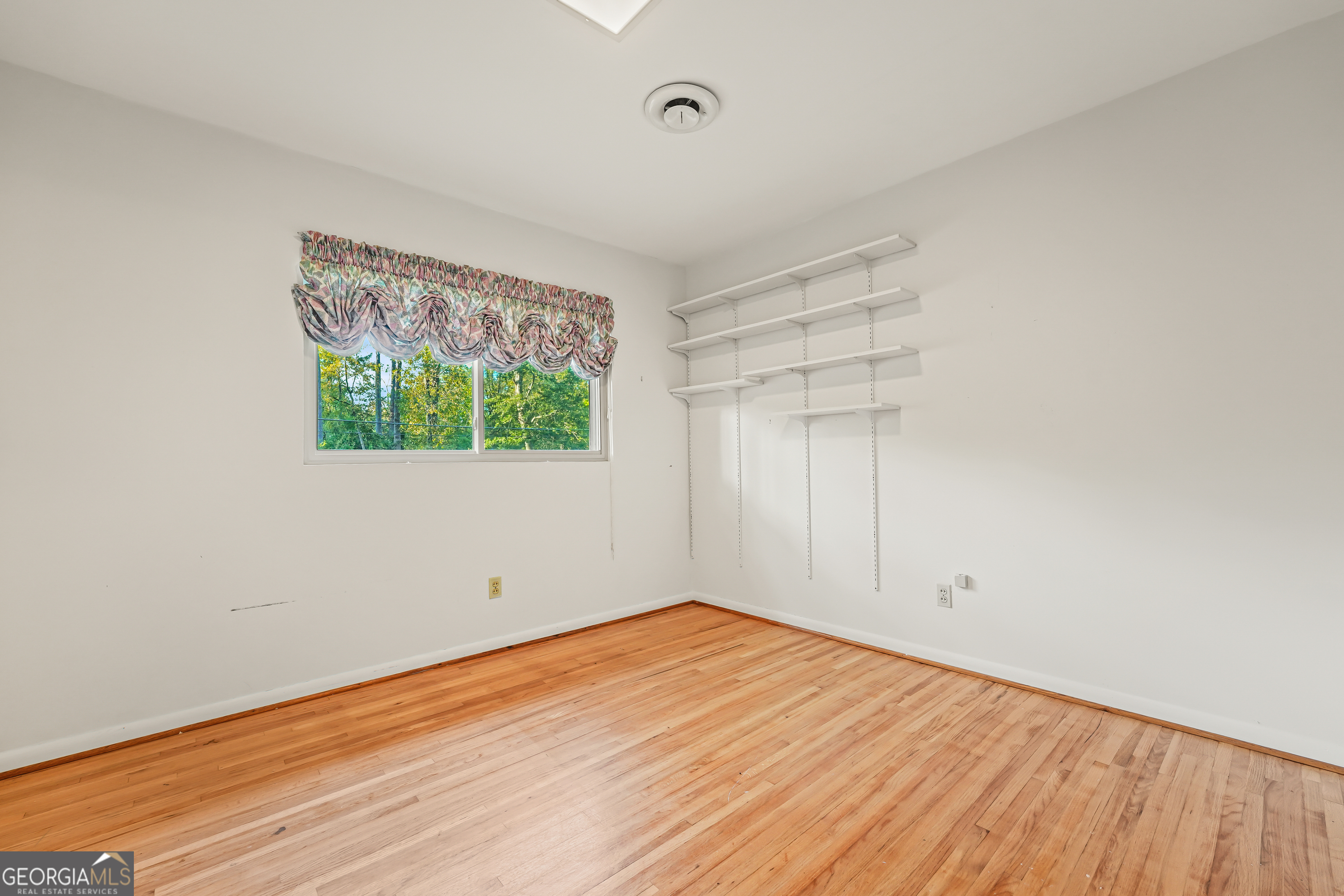 1784 Cedarwood Road Milledgeville, GA 31061 - Photo 17 of 30 an empty room with a window