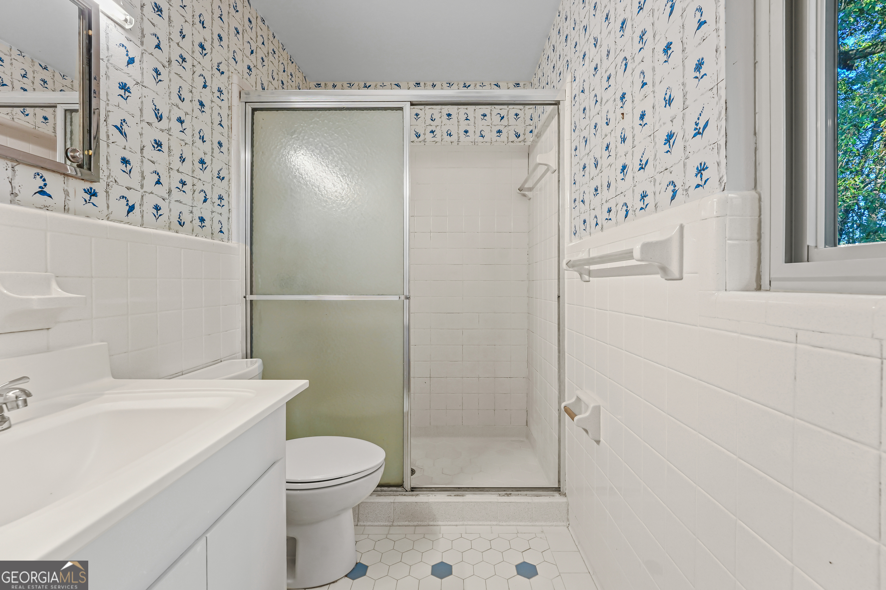 1784 Cedarwood Road Milledgeville, GA 31061 - Photo 18 of 30 a bathroom with a sink toilet and shower