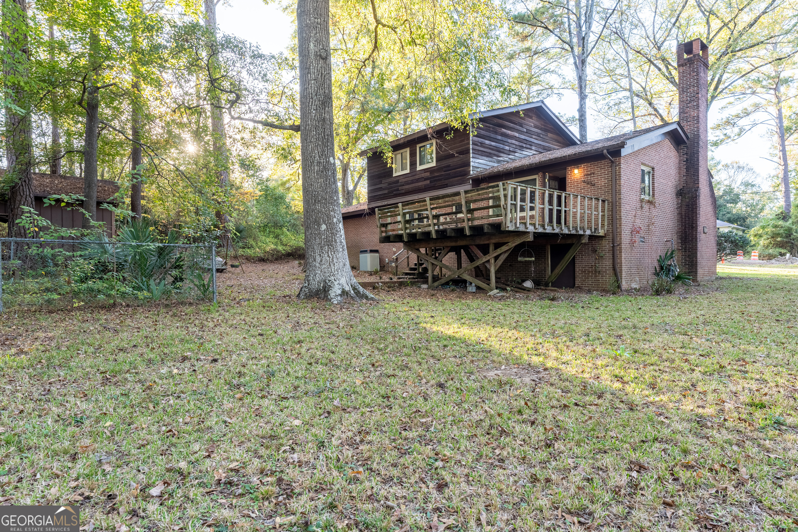 1784 Cedarwood Road Milledgeville, GA 31061 - Photo 24 of 30 a view of a house with a yard and sitting area