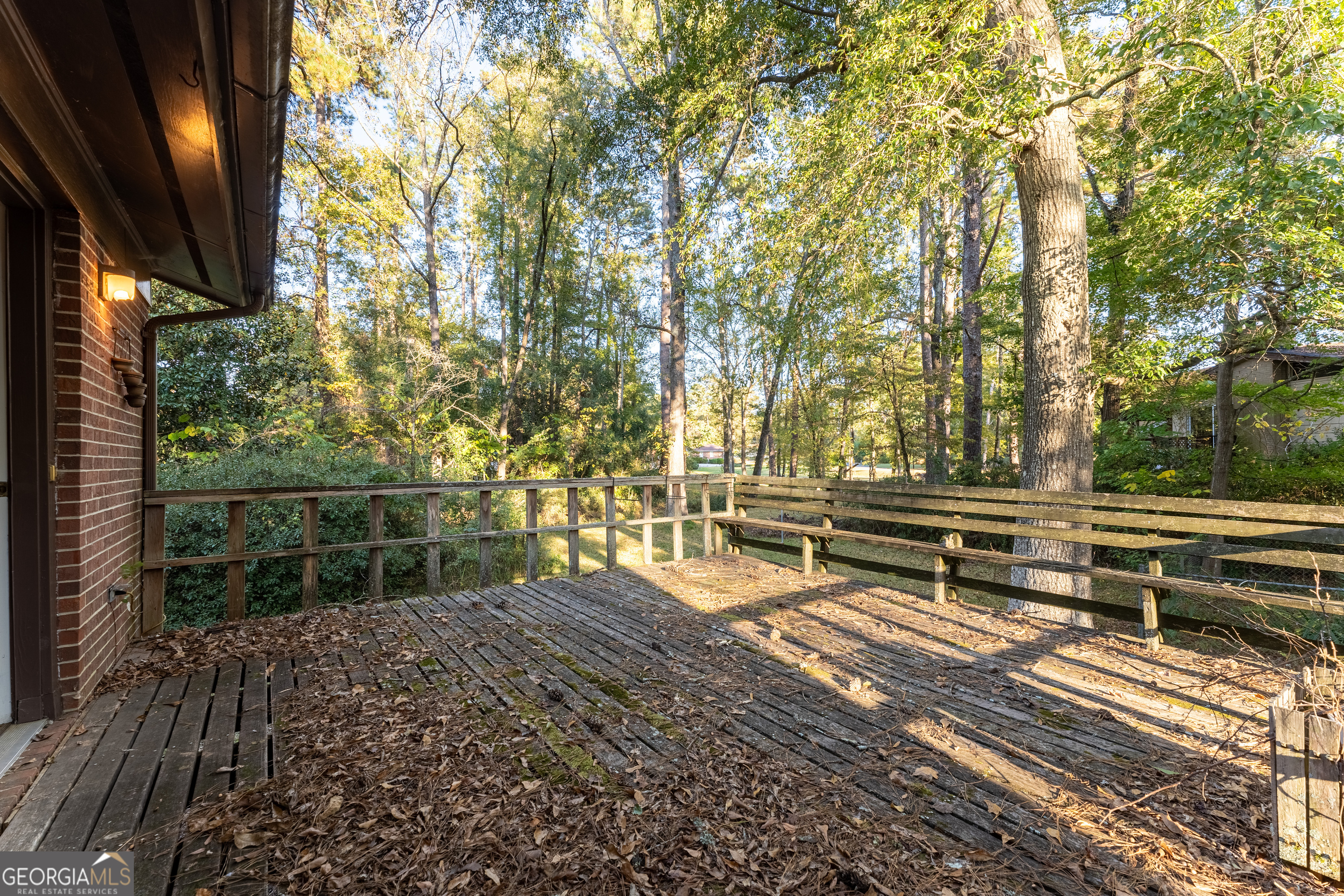 1784 Cedarwood Road Milledgeville, GA 31061 - Photo 27 of 30 a view of a bench in a yard