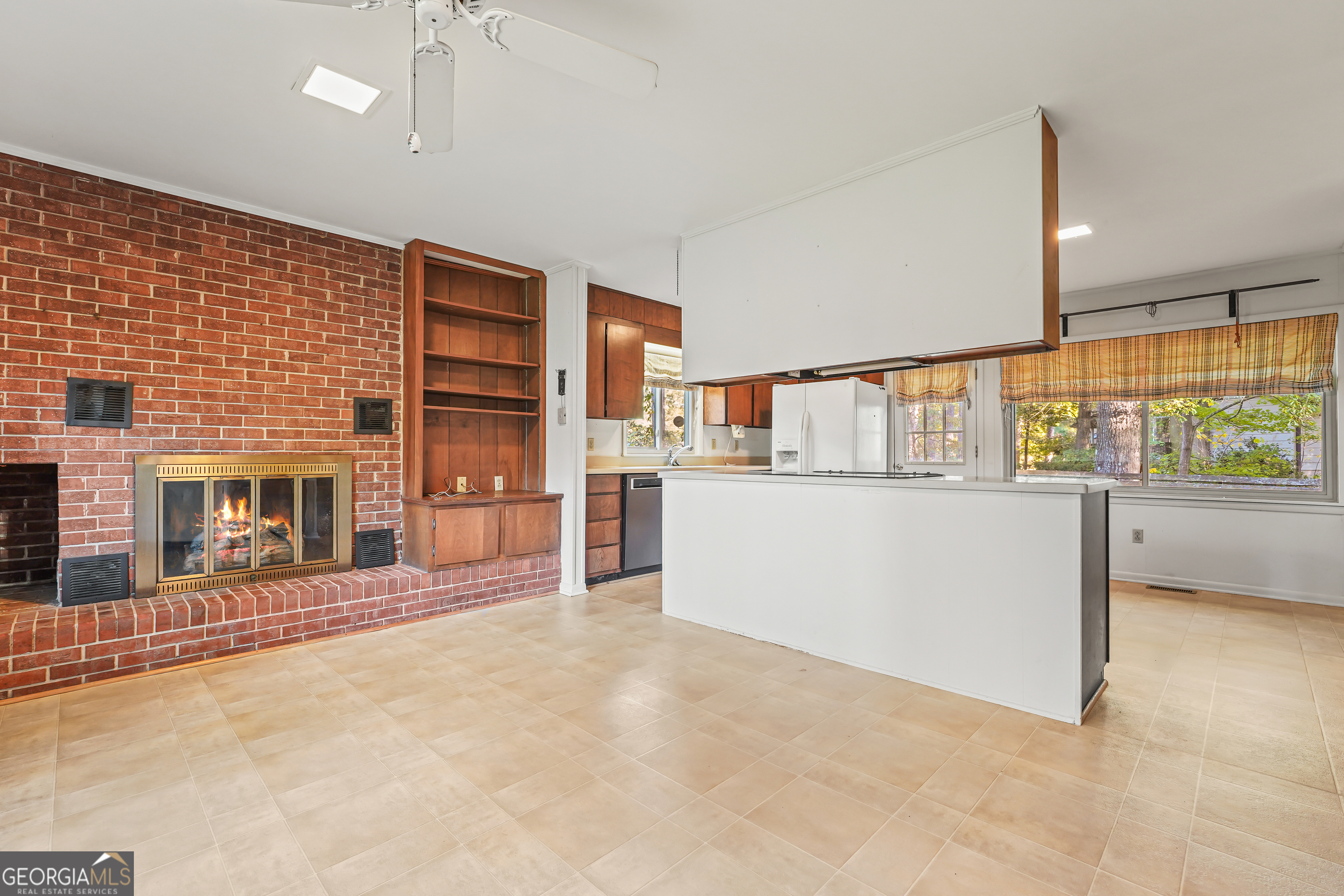 1784 Cedarwood Road Milledgeville, GA 31061 - Photo 9 of 30 a view of an empty room with a fireplace