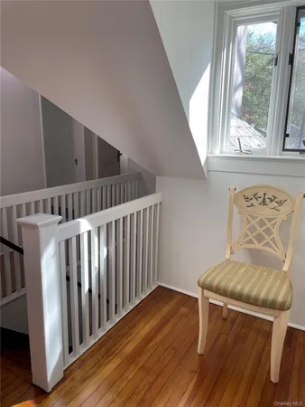 a view of entryway with wooden floor