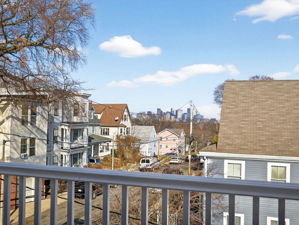 60 Stanley Street, Unit 203 Boston, MA 02125 - Photo 12 of 22 a view of a city from a balcony