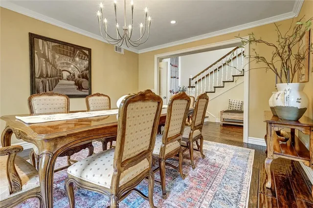 a kitchen with kitchen island granite countertop wooden cabinets a counter top space and stainless steel appliances