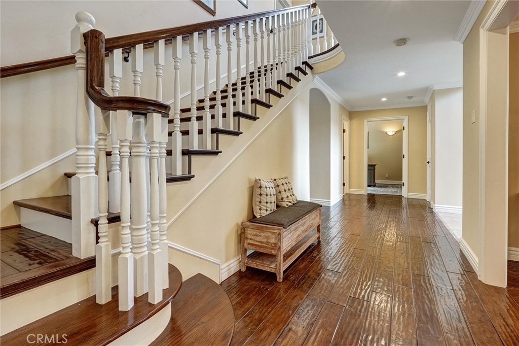 4751 Topeka Drive Tarzana, CA 91356 - Photo 28 of 65 a view of entryway and hall with wooden floor