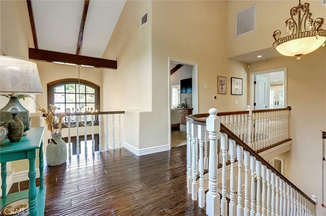 a view of balcony with wooden floor
