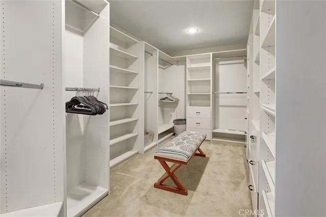 a bathroom with a sink a toilet and a window