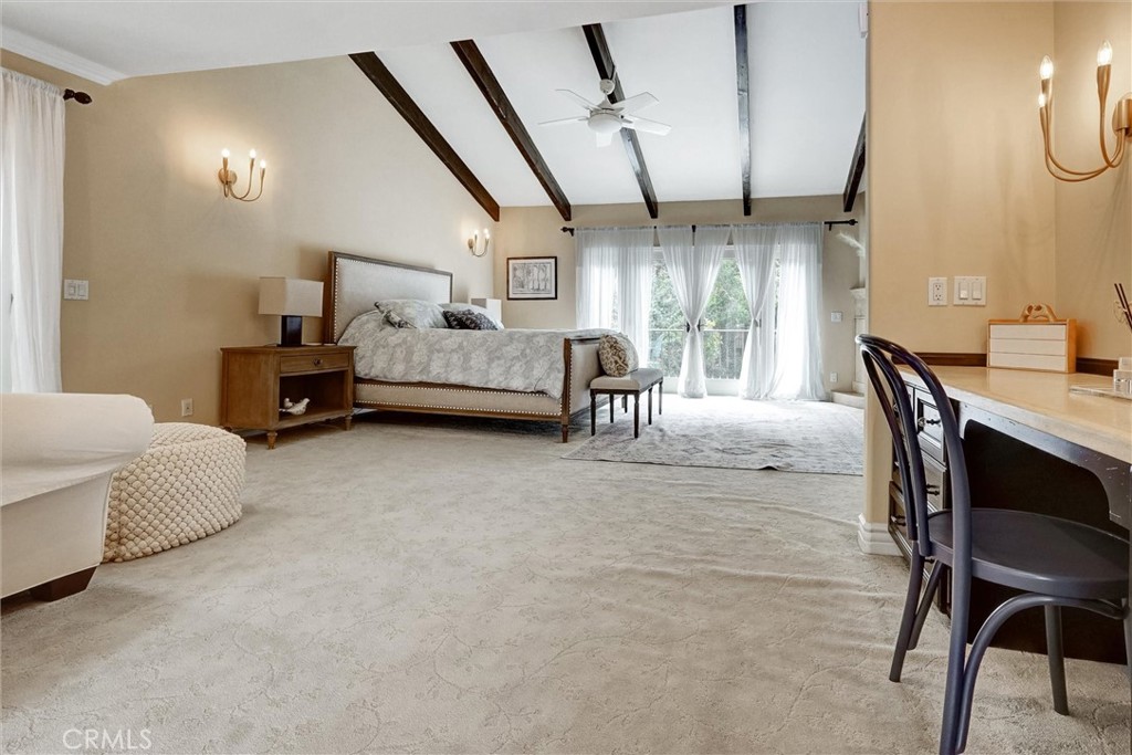 4751 Topeka Drive Tarzana, CA 91356 - Photo 38 of 65 a living room with furniture and a table