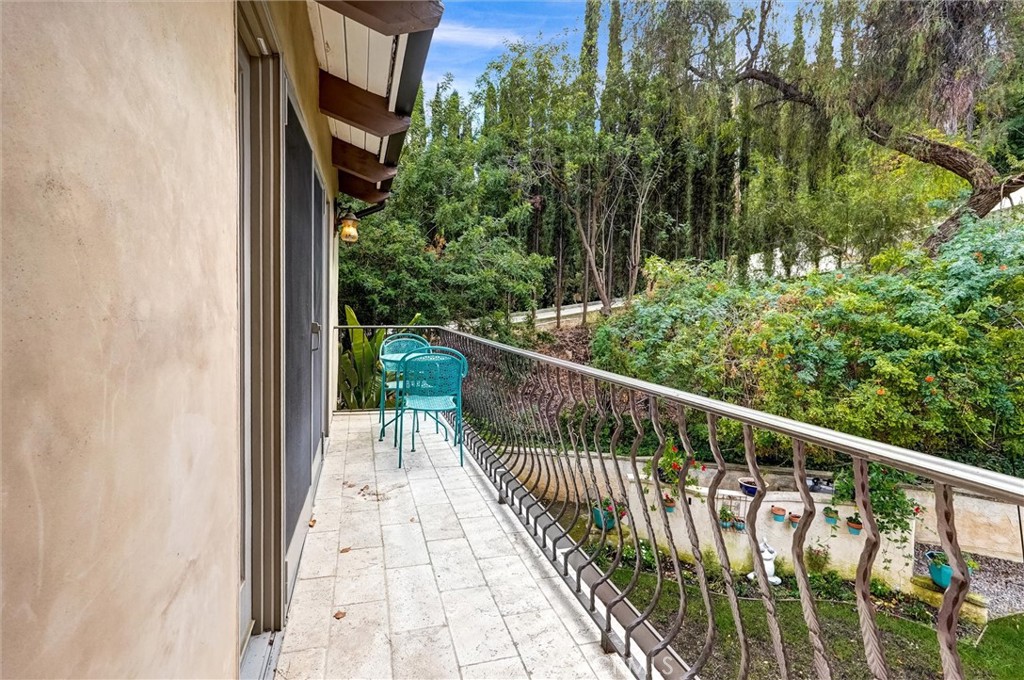 4751 Topeka Drive Tarzana, CA 91356 - Photo 39 of 65 a view of balcony with wooden floor