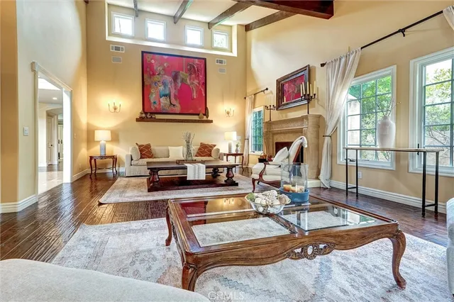 a living room with furniture and a rug