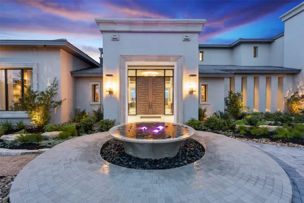 a view of a livingroom with furniture and a fireplace