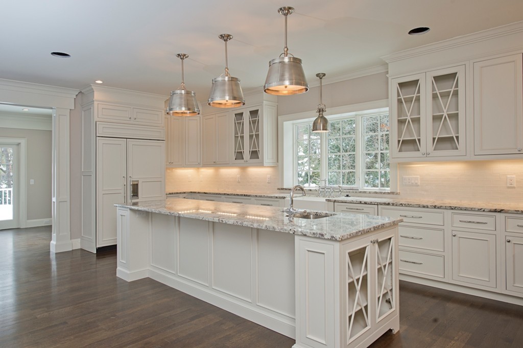 70 Loring Road Weston, MA 02493 - Photo 11 of 23 a kitchen with stainless steel appliances granite countertop a sink stove and refrigerator