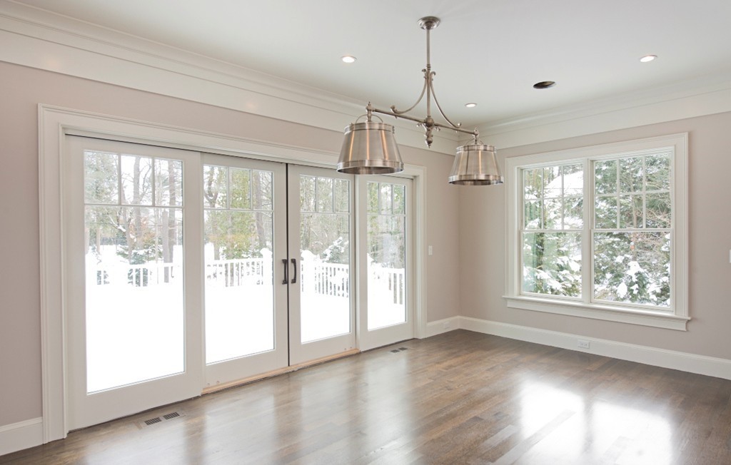 70 Loring Road Weston, MA 02493 - Photo 14 of 23 a view of a room with wooden floor and windows