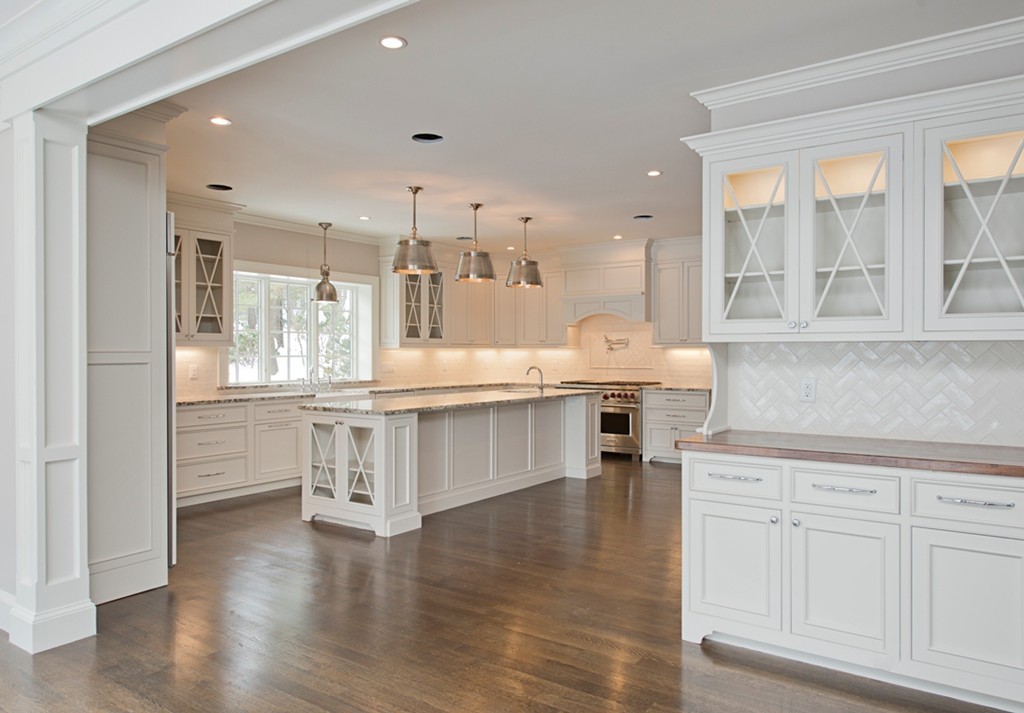 70 Loring Road Weston, MA 02493 - Photo 9 of 23 a large white kitchen with a large window