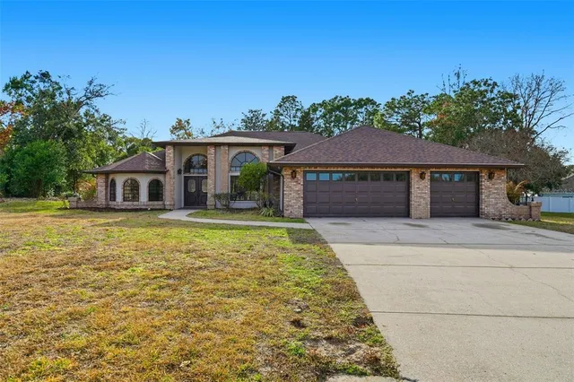 $450,000 | 11290 Orangewood Court, Spring Hill, FL 34609