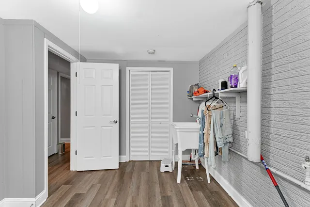 a view of livingroom with furniture and wooden floor