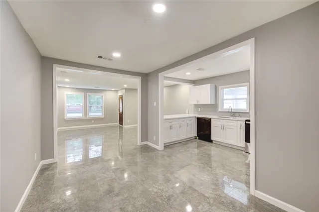 a bathroom with a sink a toilet and a bathtub