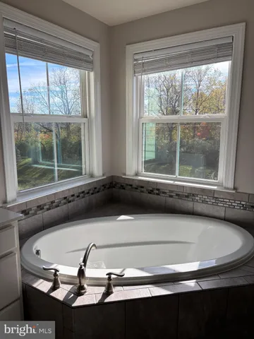 a sink sitting in front of a window