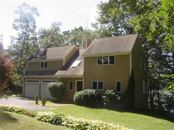 81 Edgewater Road Mashpee, MA 02649 - Photo 3 of 13 a front view of a house with a yard