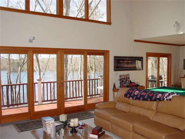 81 Edgewater Road Mashpee, MA 02649 - Photo 7 of 13 a living room with furniture and a large window