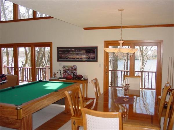 81 Edgewater Road Mashpee, MA 02649 - Photo 8 of 13 a view of a dining room with furniture window and wooden floor