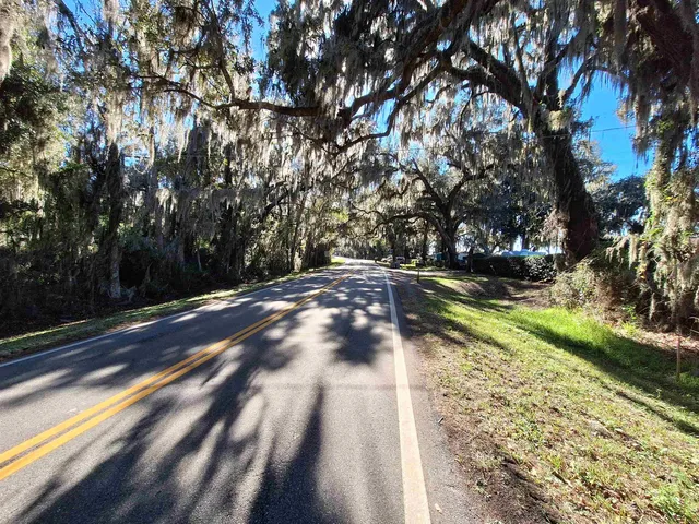 a view of swimming pool with a yard
