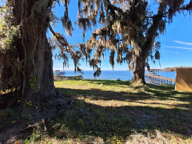 a view of swimming pool with a yard