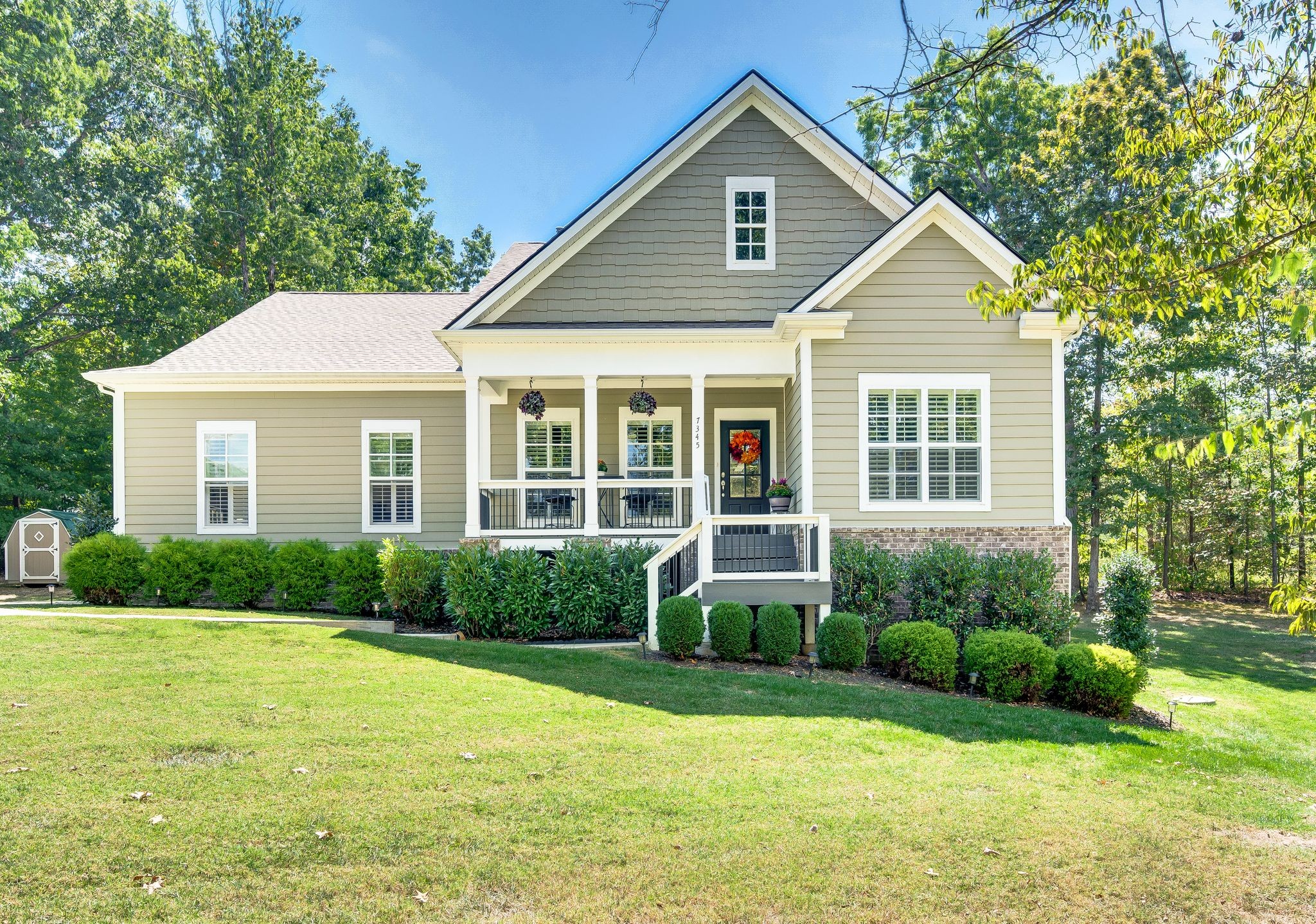 7345 Taylor Road Fairview, TN 37062 - Photo 1 of 65 a view of a house with a yard and plants