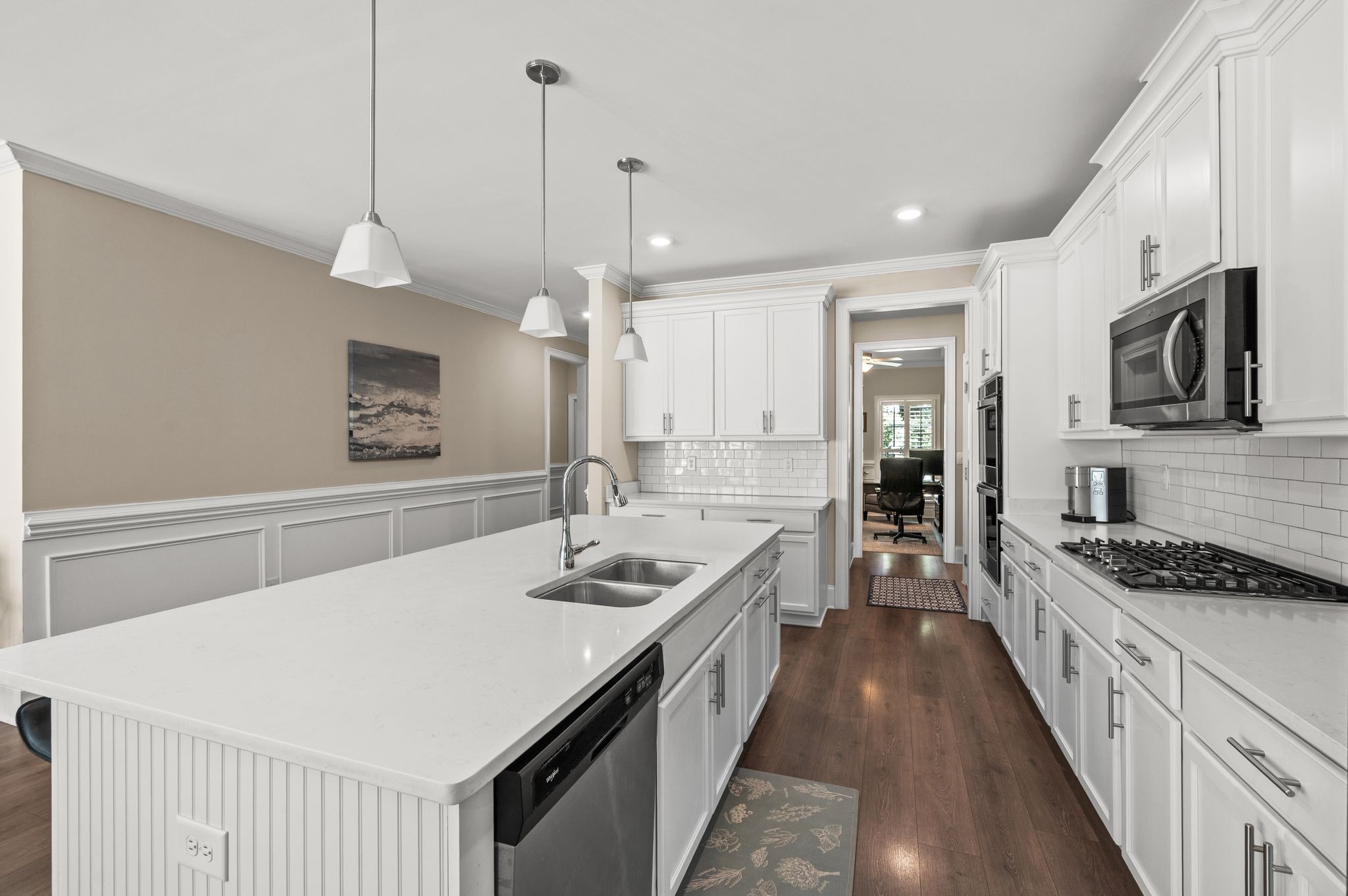 7345 Taylor Road Fairview, TN 37062 - Photo 16 of 65 a kitchen with stainless steel appliances kitchen island a sink stove and cabinets