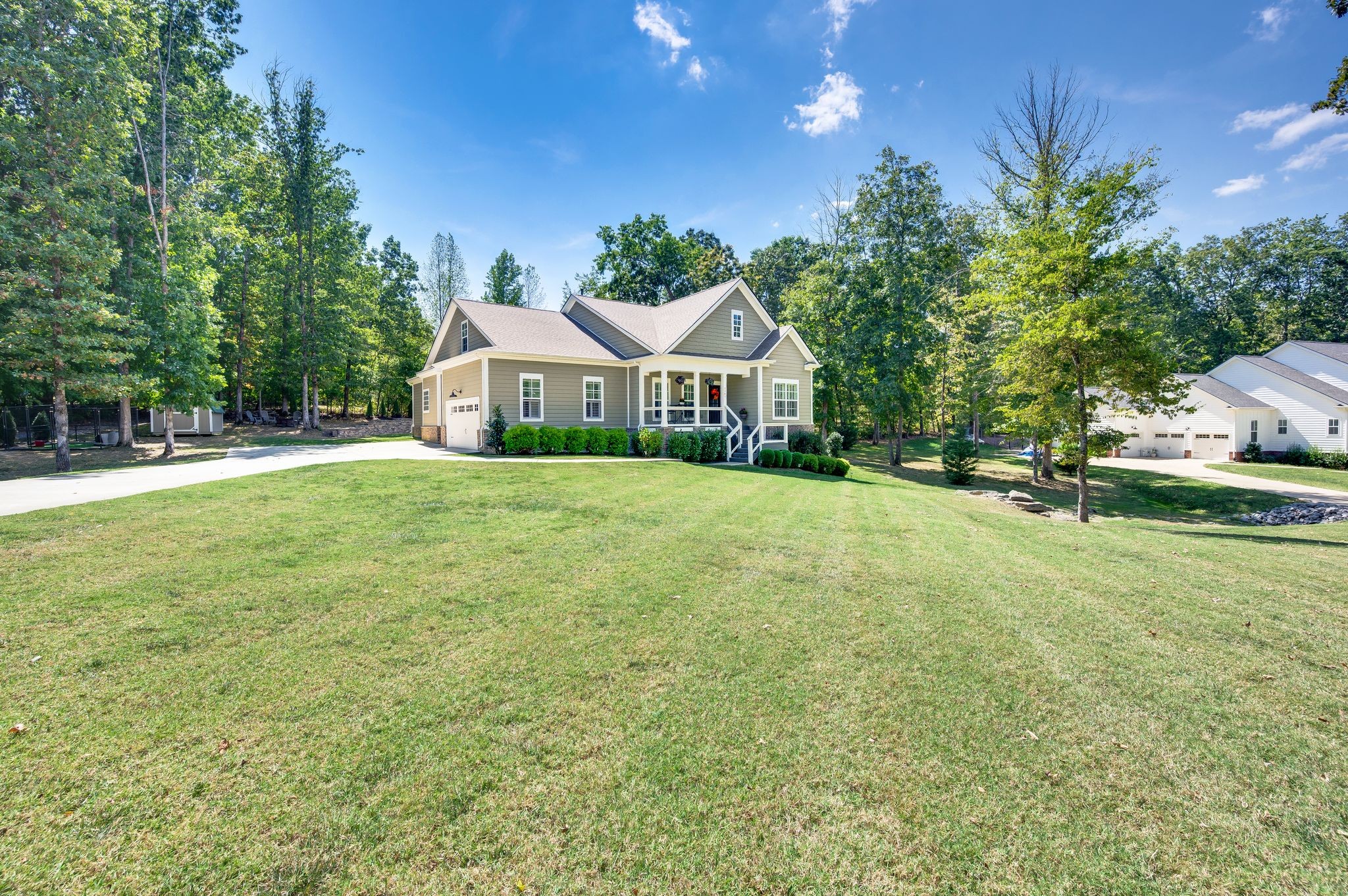 7345 Taylor Road Fairview, TN 37062 - Photo 2 of 65 a front view of a house with a yard and trees