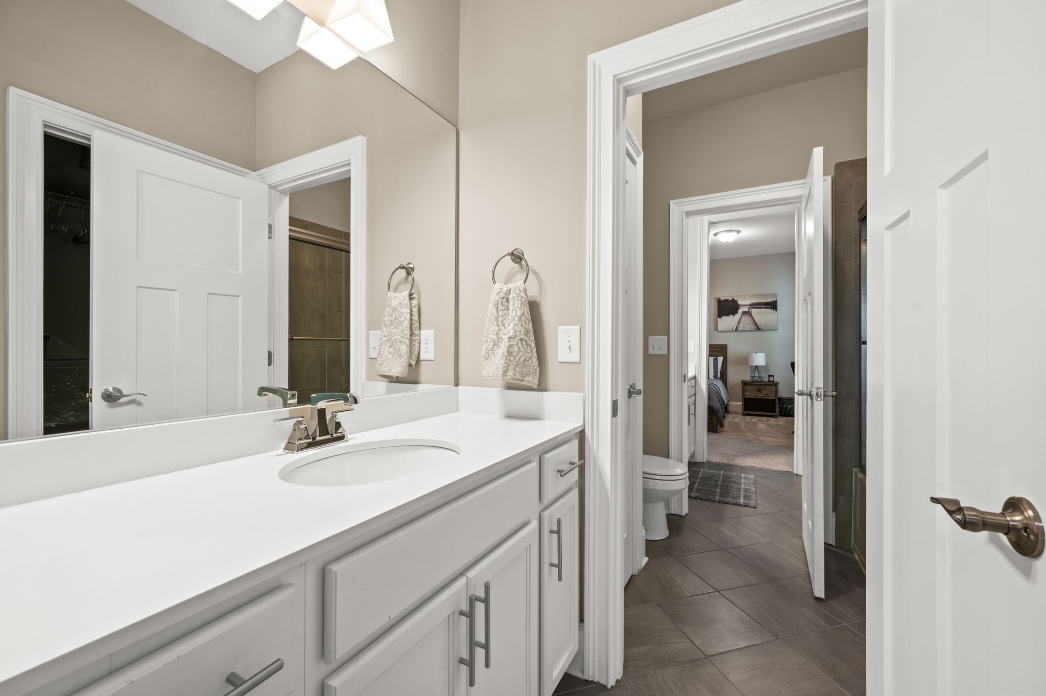 7345 Taylor Road Fairview, TN 37062 - Photo 39 of 65 a bathroom with a sink and a mirror