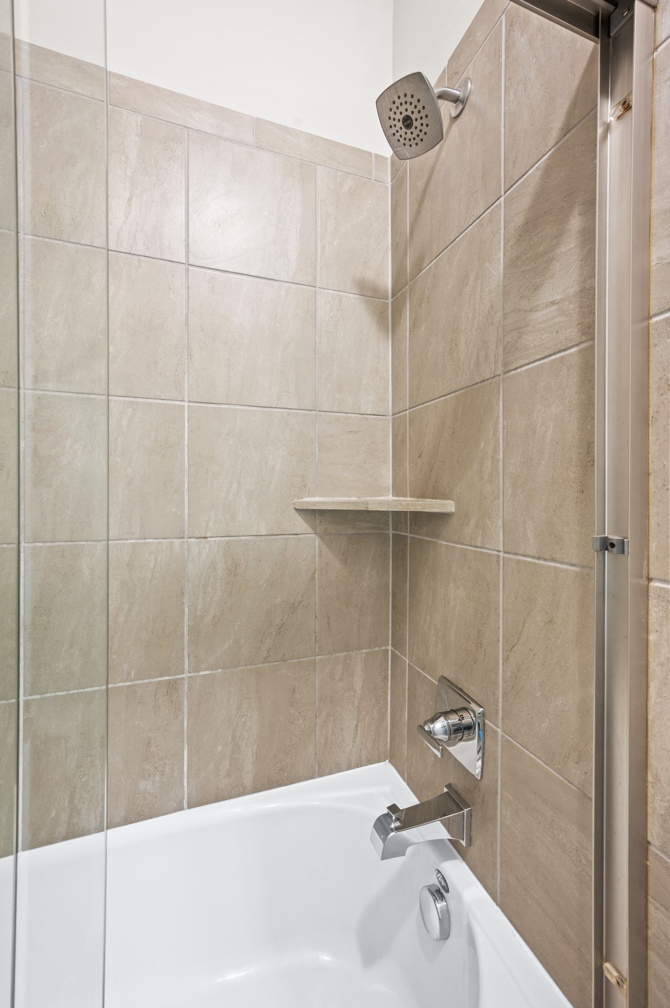 7345 Taylor Road Fairview, TN 37062 - Photo 42 of 65 a bathroom with a bathtub and a shower