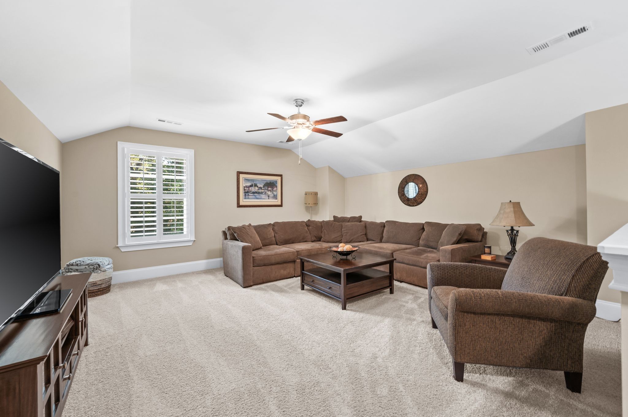 7345 Taylor Road Fairview, TN 37062 - Photo 44 of 65 a living room with furniture and a flat screen tv