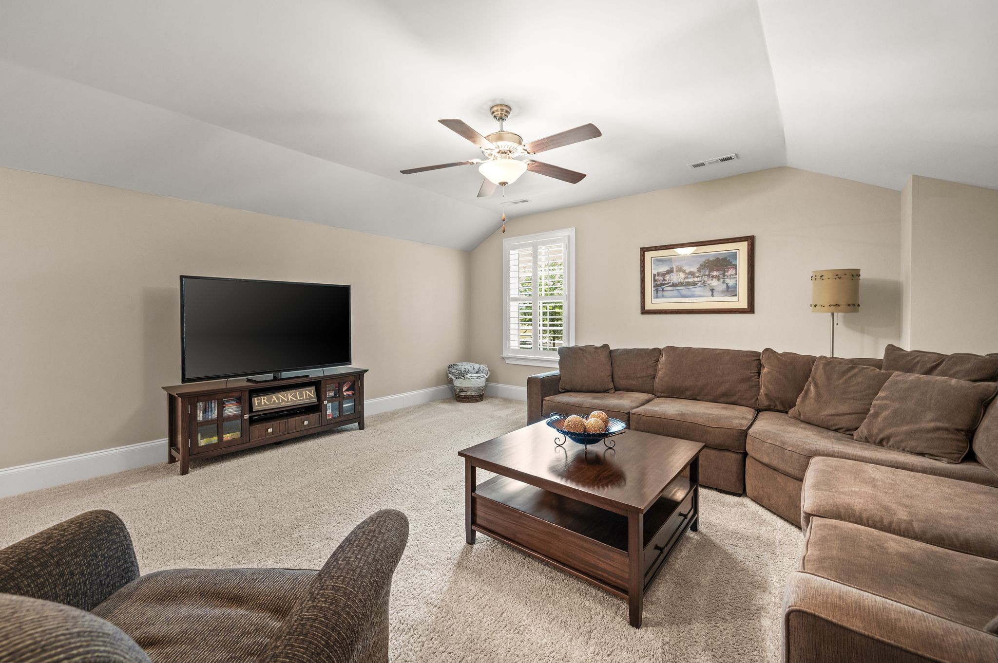 7345 Taylor Road Fairview, TN 37062 - Photo 47 of 65 a living room with furniture and a flat screen tv