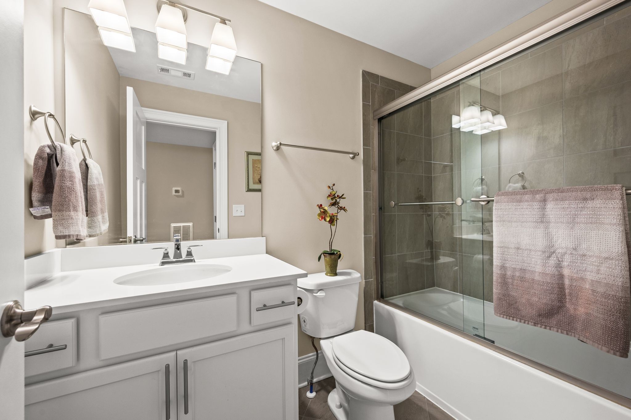 7345 Taylor Road Fairview, TN 37062 - Photo 48 of 65 a bathroom with a sink a toilet and shower