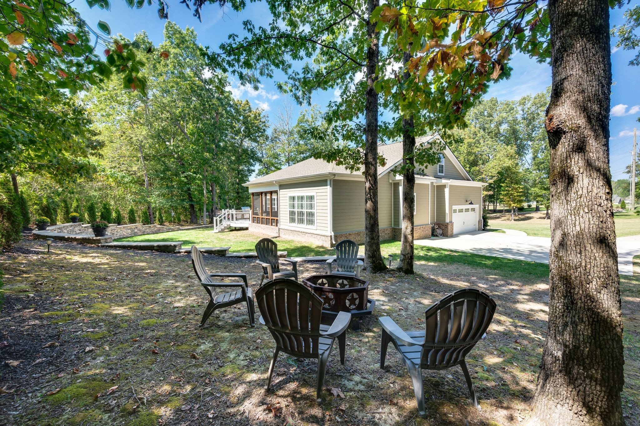 7345 Taylor Road Fairview, TN 37062 - Photo 60 of 65 a view of a house with backyard and sitting area