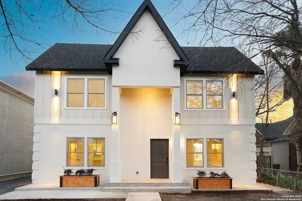 a front view of a house with parking