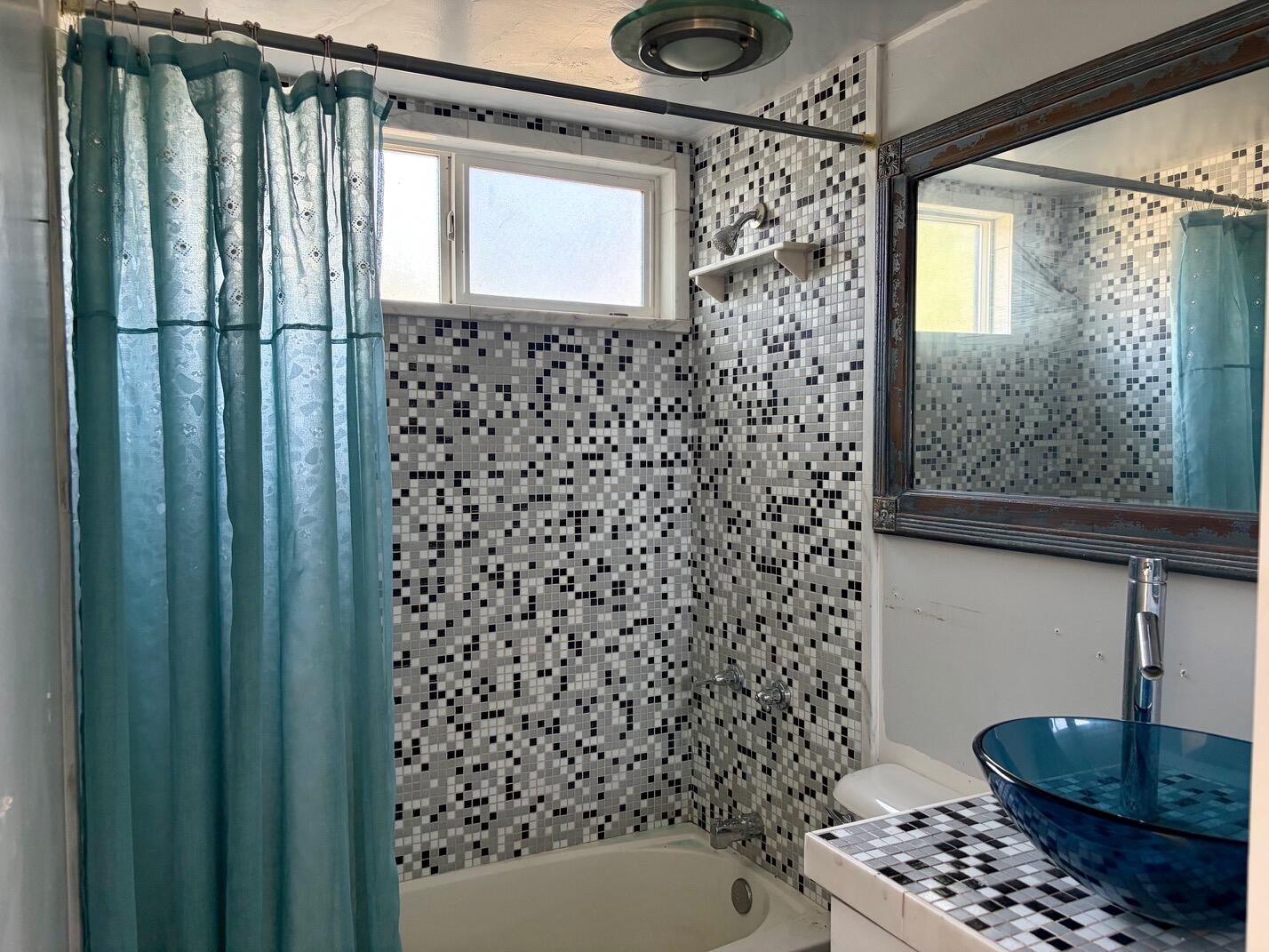 3750 Paradise Road, Unit 97 Santa Barbara, CA 93105 - Photo 7 of 17 a bathroom with a bathtub and shower