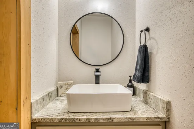 a living room with a couch and a table