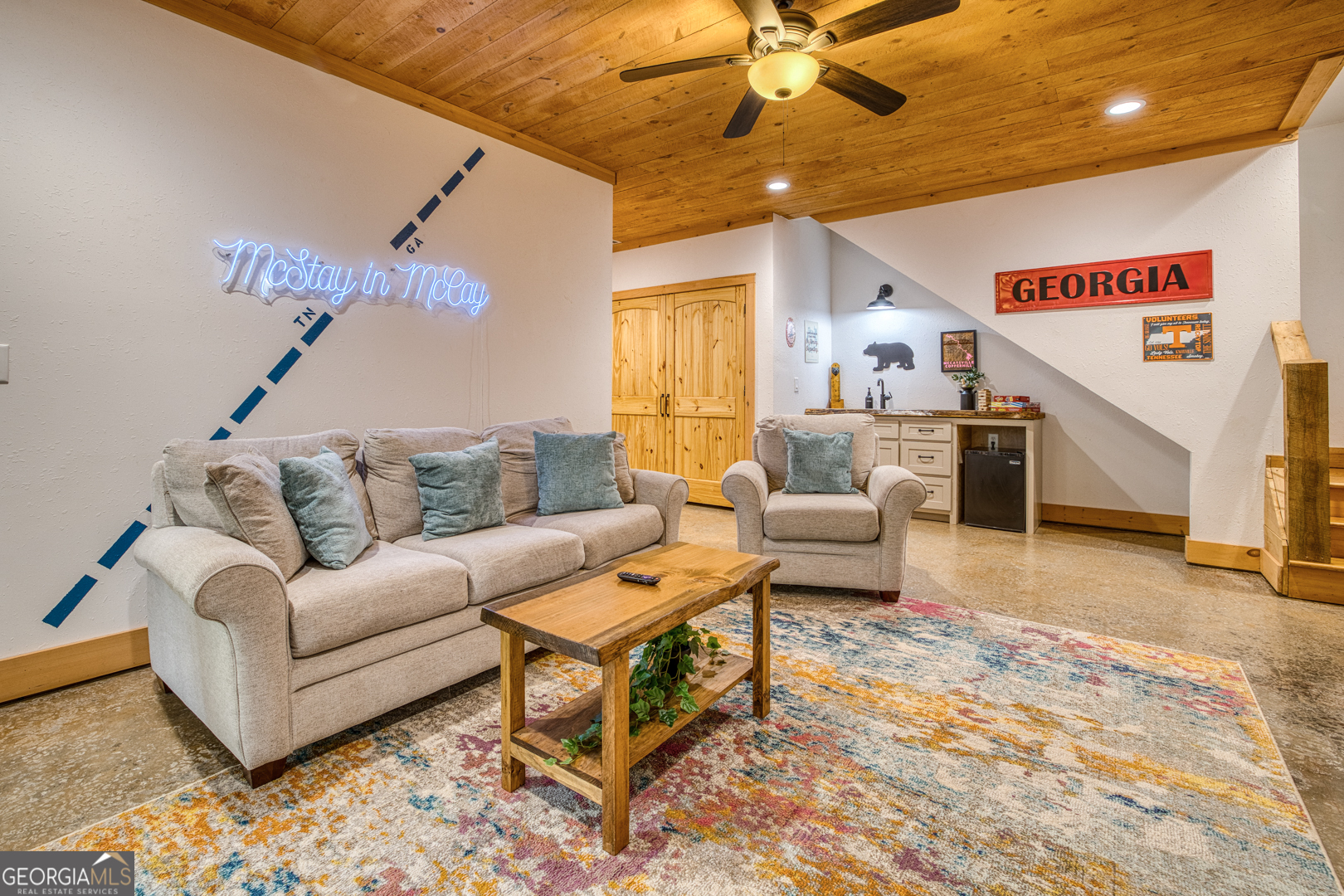 284 Lees Ride McCaysville, GA 30555 - Photo 35 of 104 a living room with furniture and a chandelier