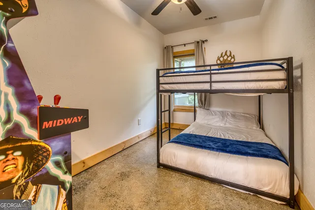 a wooden bench sitting in front of a building