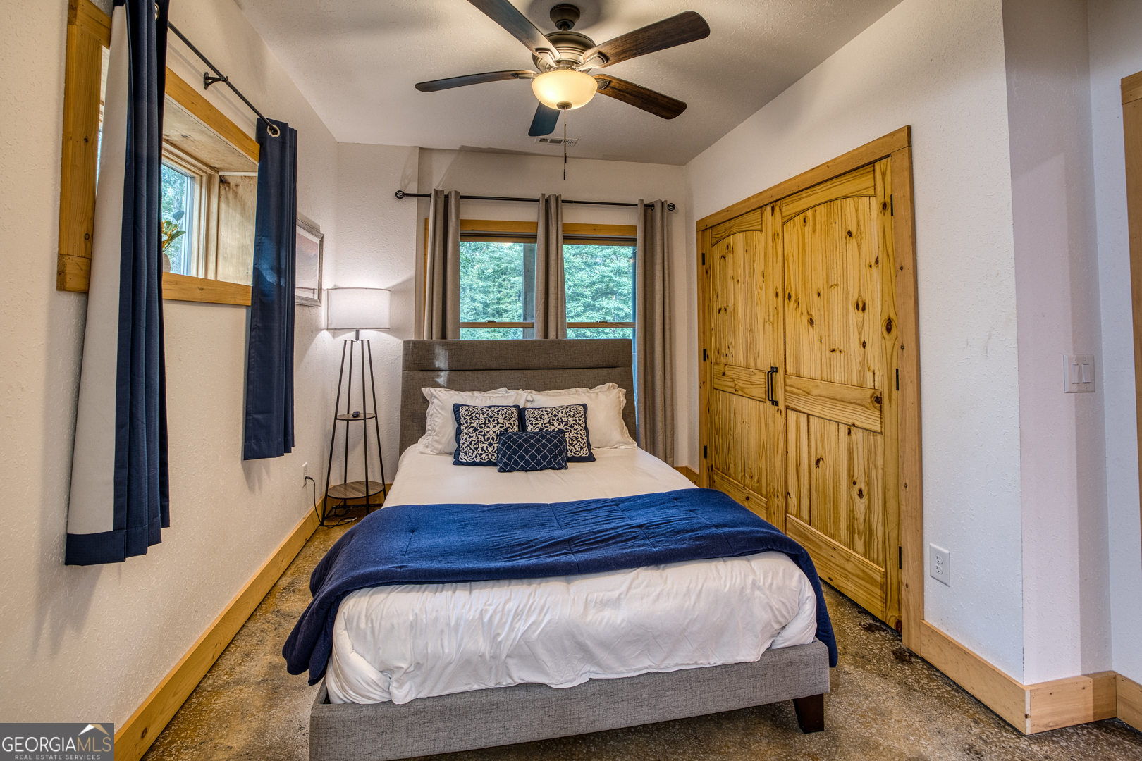 284 Lees Ride McCaysville, GA 30555 - Photo 53 of 104 a bedroom with a bed and a window