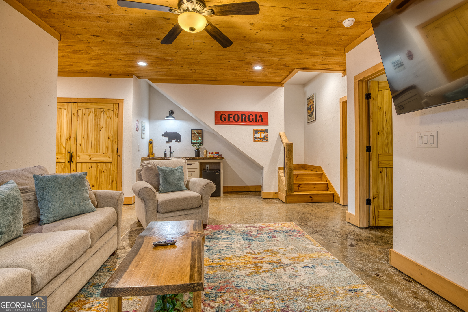 284 Lees Ride McCaysville, GA 30555 - Photo 61 of 104 a living room with furniture and a flat screen tv